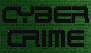 Cybercrime text on binary code background.