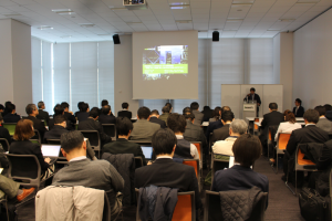 Conference attendees listening to a presentation.