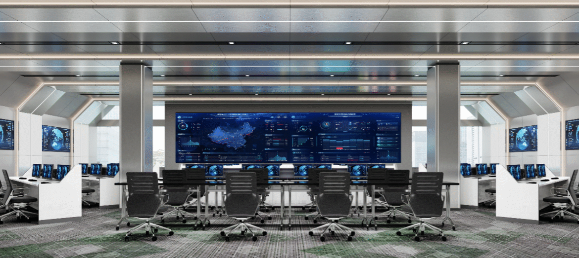 Modern control room with large digital screens and ergonomic chairs.